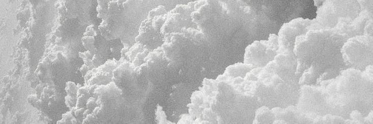 Soft clouds above the Jesus Saves collection